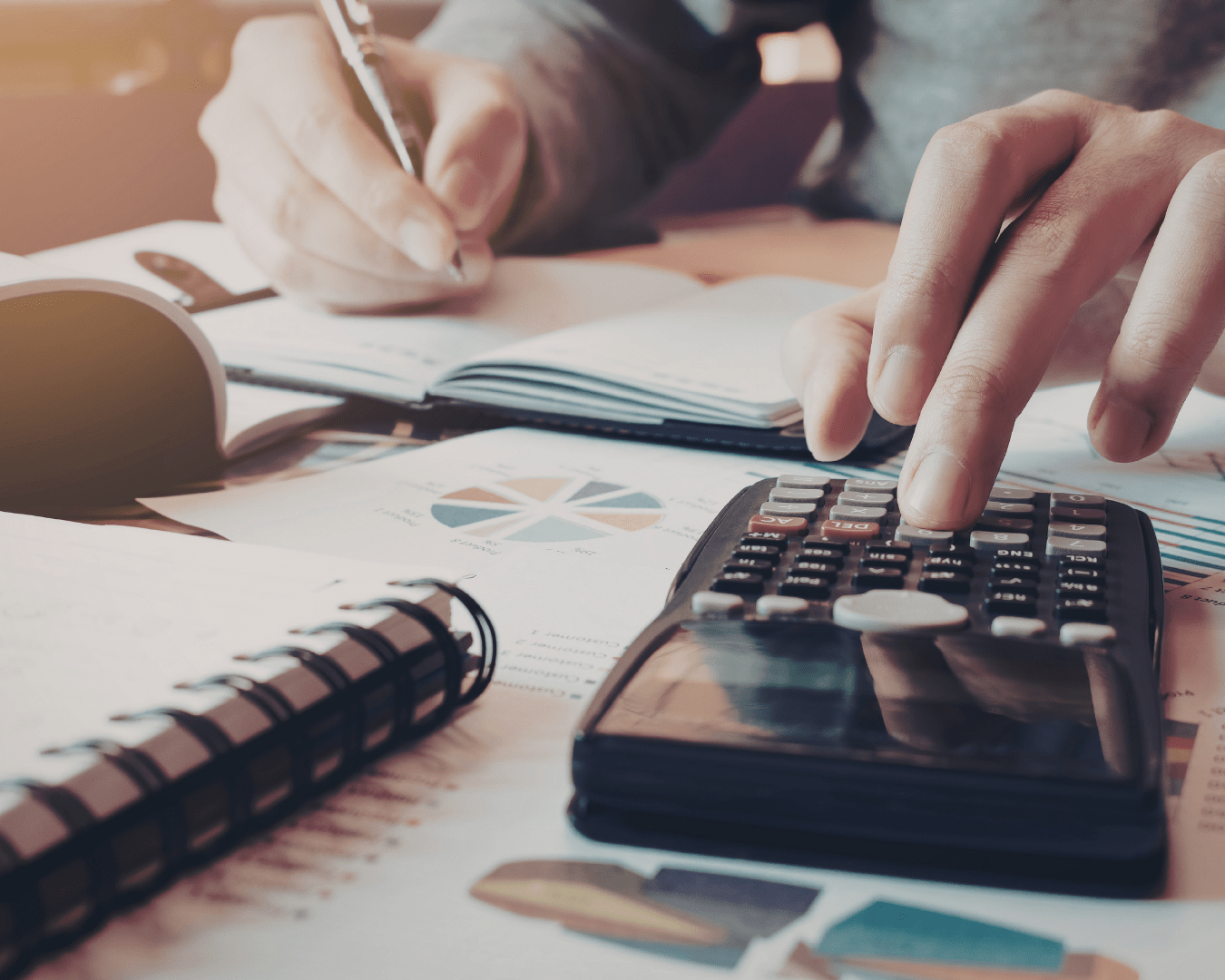 business owner planning long term tax strategy and financial decisions to reduce taxable income