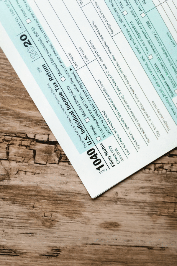 Tax documents on a desk during tax planning for physicians 