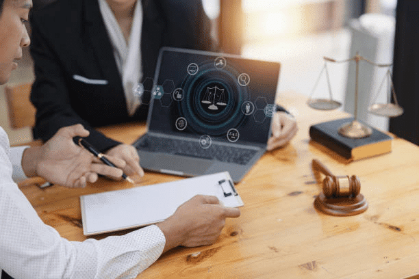 A lawyer and medical professional discussing asset protection