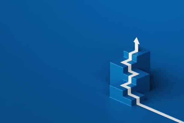 3D illustration of a white arrow climbing blue stacked blocks, representing upward growth.