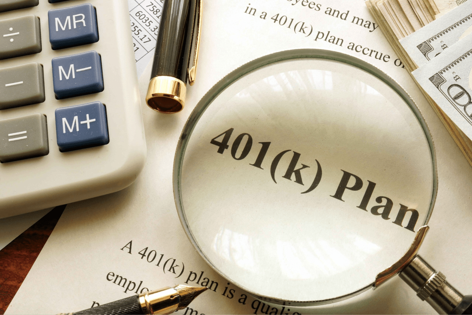 Image of a magnifying glass over the word 401(k) Plan with taxes around