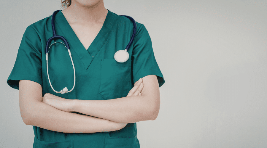 A depiction of a doctor in medical clothing. 