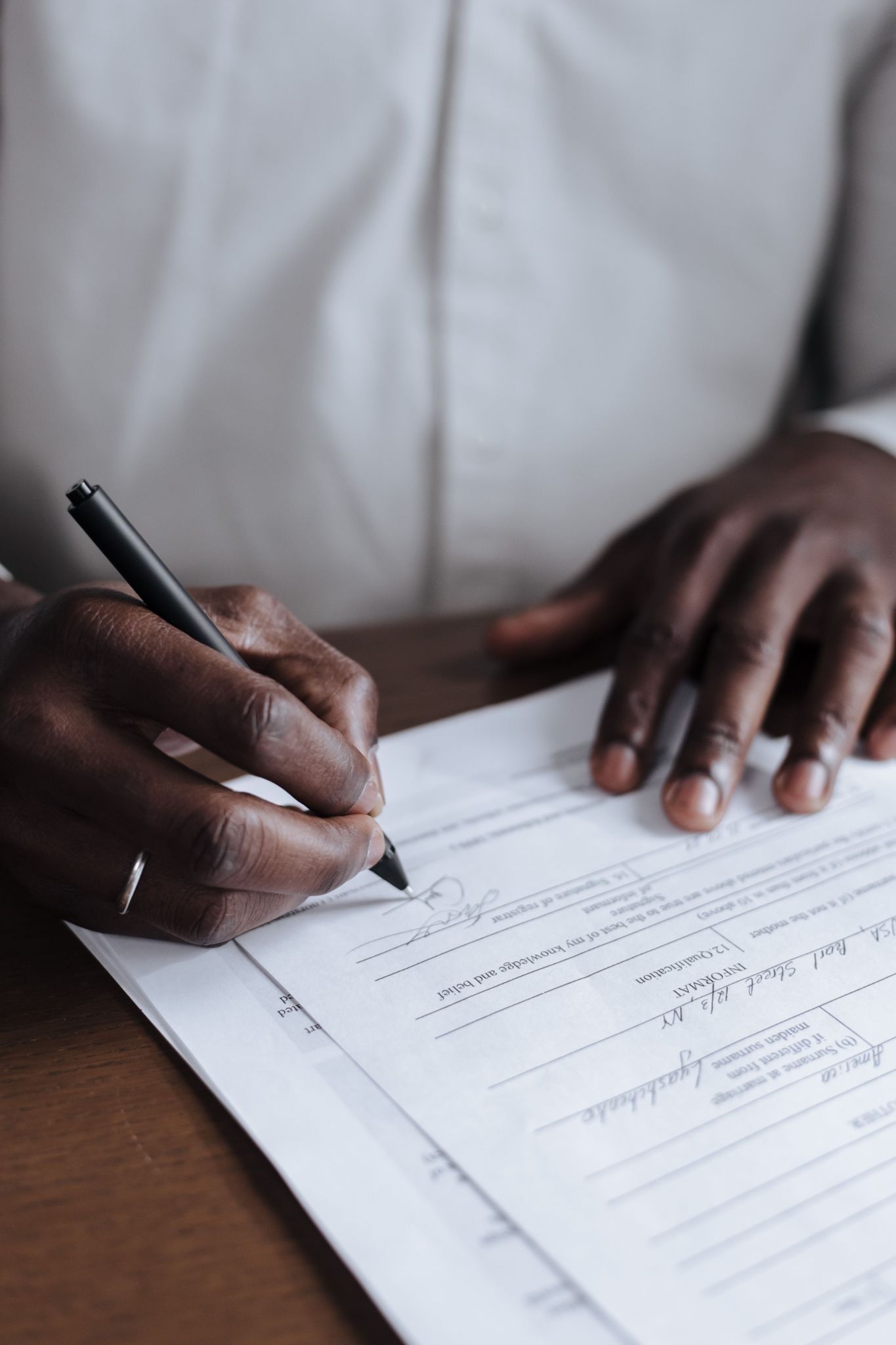 Close-up of a physician's practice formation documents and operating agreement on a desk